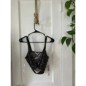 Story on Women’s size Medium Floral Tanktop